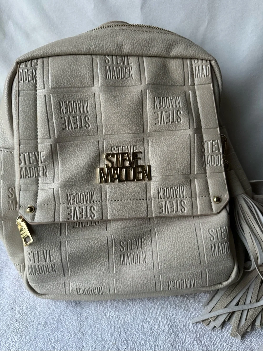 Steve Madden Cream Quilted Logo Backpack with Tassel